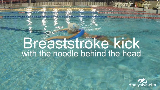 Breaststroke kick with the noodle behind the head
