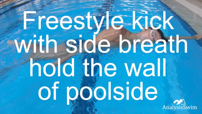 Freestyle kick with side breath hold the wall of poolside perpendicular