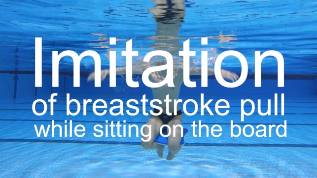 фото для Imitation of a breaststroke pull while sitting on the board 